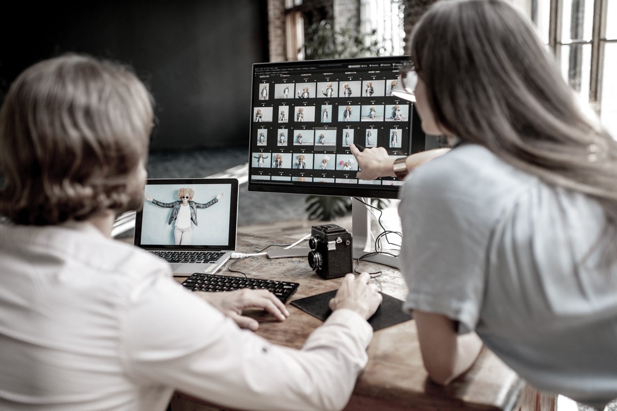 People working with computer photographs