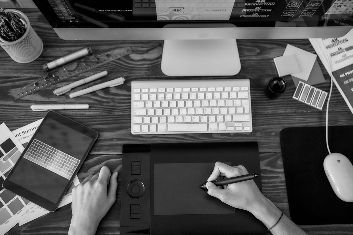 A Mac computer with a graphics tablet